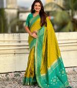 yellow patola silk saree with ikat weaving