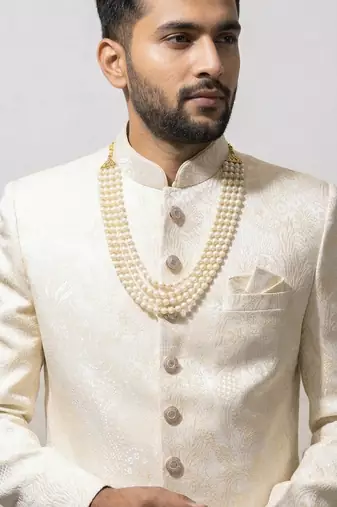 beige silk sherwani set with brasso work