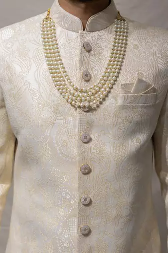 beige silk sherwani set with brasso work