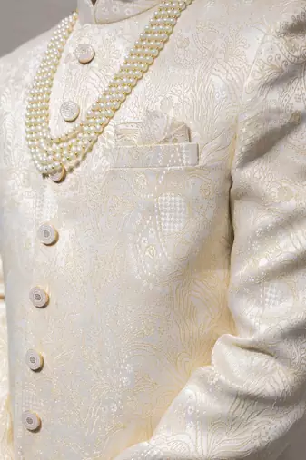 beige silk sherwani set with brasso work