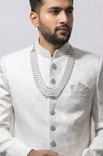 white silk sherwani set with brasso work