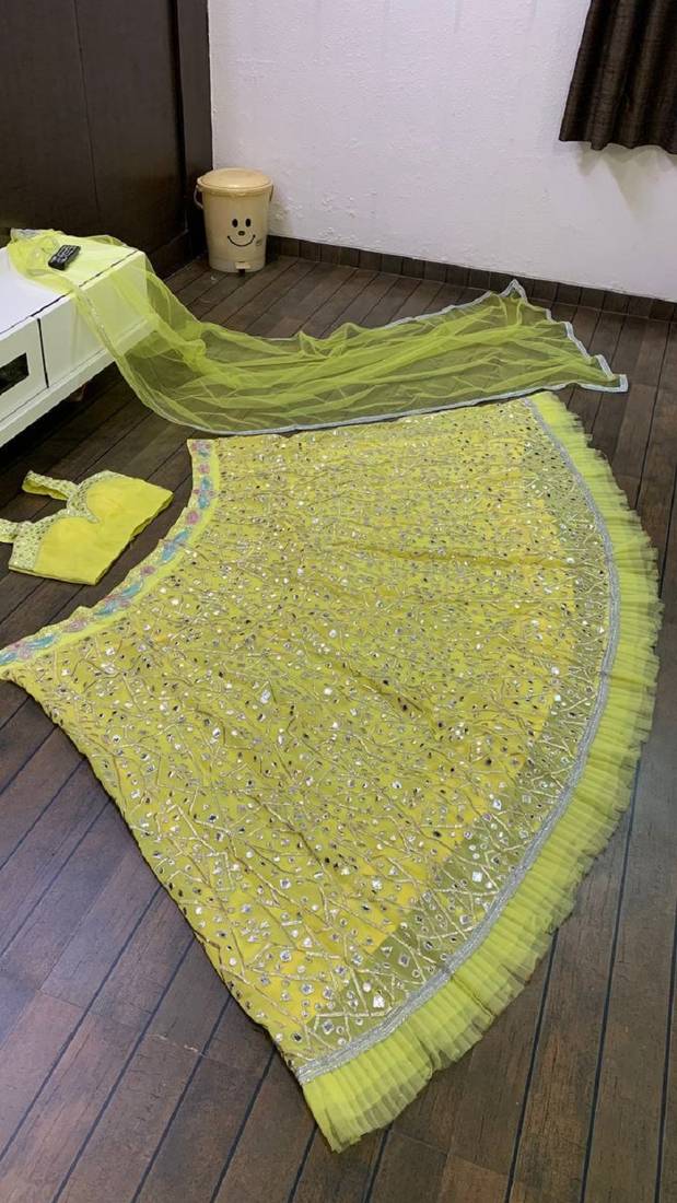 Elegant Yellow Embroidered Lehenga Choli Set with Net Dupatta