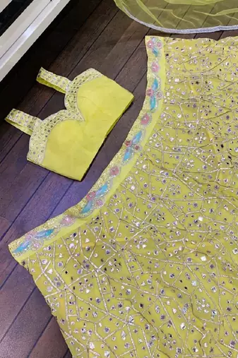 Elegant Yellow Embroidered Lehenga Choli Set with Net Dupatta