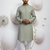 green linen men kurta pajama with minimal work