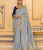 Gray crepe silk saree, beautifully crafted with rich zari weaving
