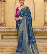 Blue crepe silk saree, beautifully crafted with rich zari weaving