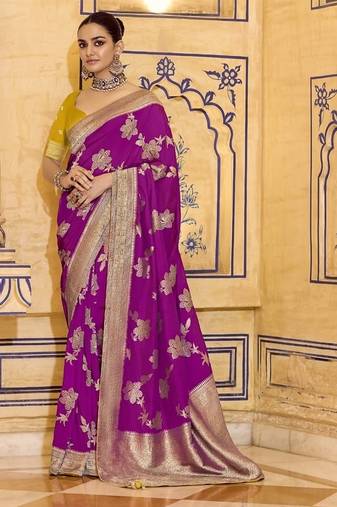 Rani pink crepe silk saree, beautifully crafted with rich zari weaving