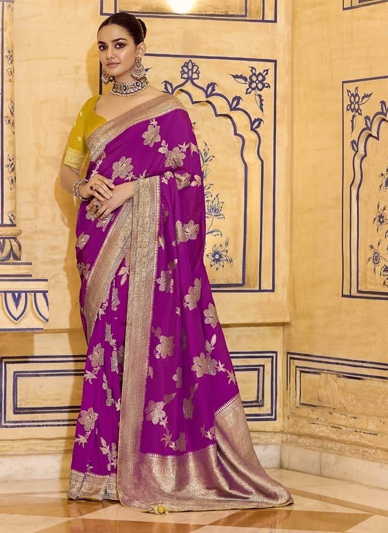Rani pink crepe silk saree, beautifully crafted with rich zari weaving