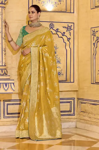 Mustard crepe silk saree, beautifully crafted with rich zari weaving
