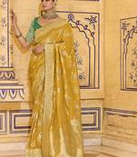 mustard crepe silk saree with rich zari weaving