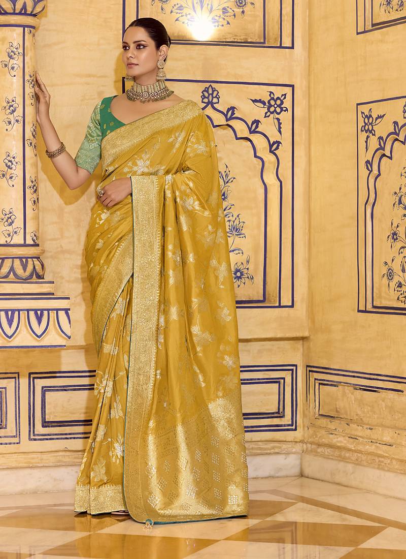 Mustard crepe silk saree, beautifully crafted with rich zari weaving