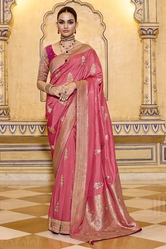 Peach crepe silk saree, beautifully crafted with rich zari weaving