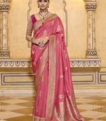 Peach crepe silk saree, beautifully crafted with rich zari weaving