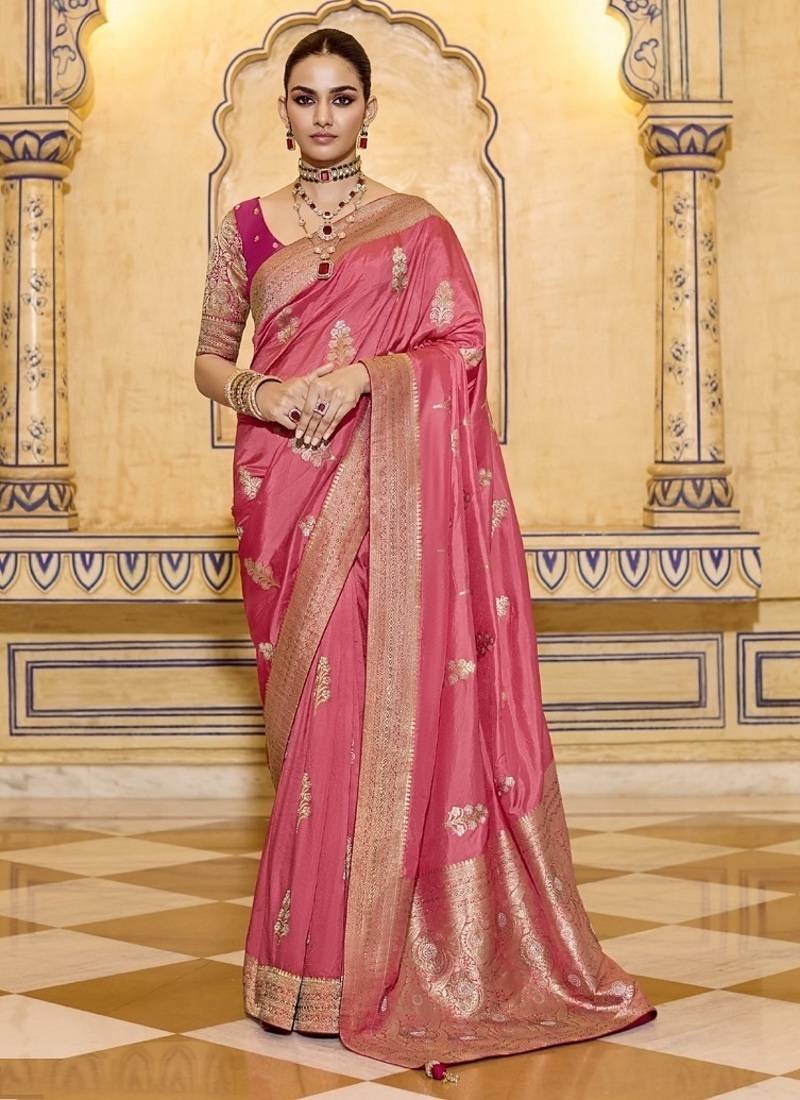 Peach crepe silk saree, beautifully crafted with rich zari weaving