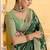 Green crepe silk saree, beautifully crafted with rich zari weaving