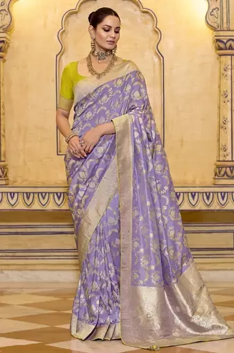 Lavender crepe silk saree, beautifully crafted with rich zari weaving