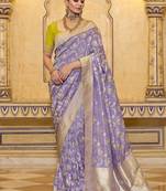 Lavender crepe silk saree, beautifully crafted with rich zari weaving
