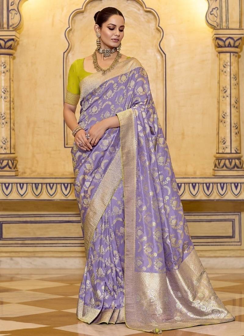 Lavender crepe silk saree, beautifully crafted with rich zari weaving