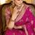 Rani pink crepe silk saree, beautifully crafted with rich zari weaving
