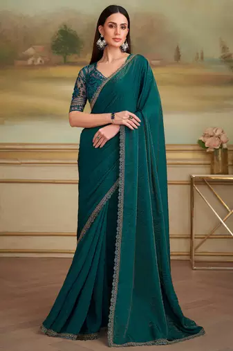 green georgette silk saree with embroidered blouse