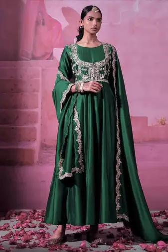 Green chinnon silk solid flared gown with sequins embroidered koti and dupatta