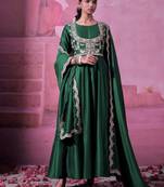 Green chinnon silk solid flared gown with sequins embroidered koti and dupatta