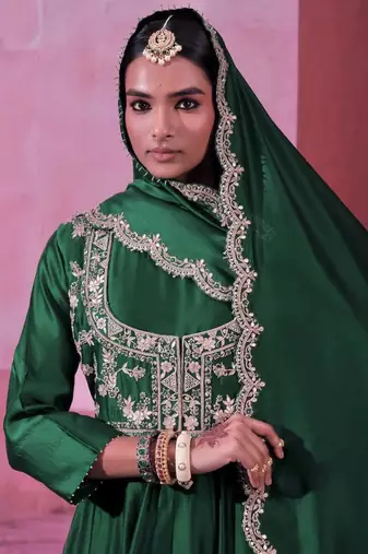 Green chinnon silk solid flared gown with sequins embroidered koti and dupatta