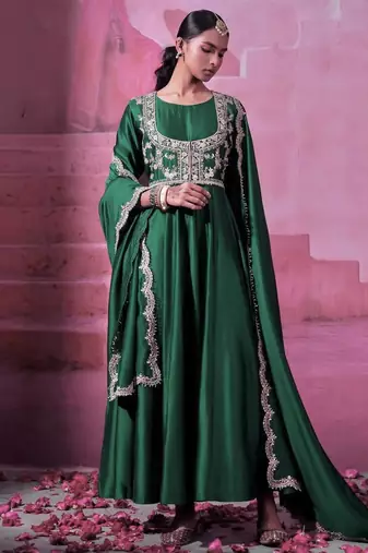 Green chinnon silk solid flared gown with sequins embroidered koti and dupatta