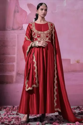 Maroon chinnon silk solid flared gown with sequins embroidered koti and dupatta