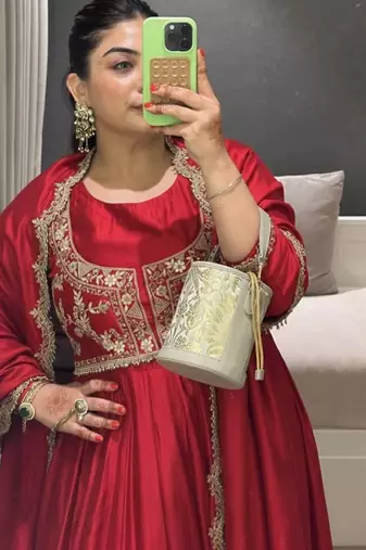 Maroon chinnon silk solid flared gown with sequins embroidered koti and dupatta