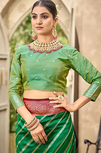 Bottle green & red banarasi silk saree with heavy woven zari work
