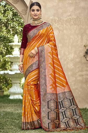 Elegant orange banarasi silk saree with maroon contrast blouse