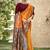 Elegant orange banarasi silk saree with maroon contrast blouse