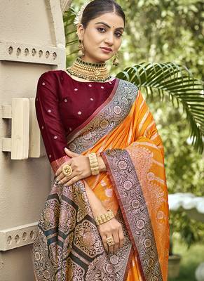 Elegant orange banarasi silk saree with maroon contrast blouse 5
