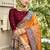 Elegant orange banarasi silk saree with maroon contrast blouse