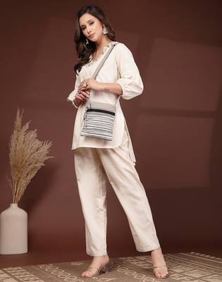 grey acrylic sling bag with striped pattern 8