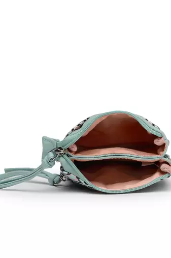 teal canvas sling bag with geometric print