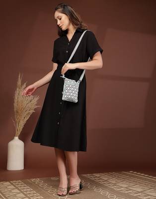 teal canvas sling bag with geometric print 8