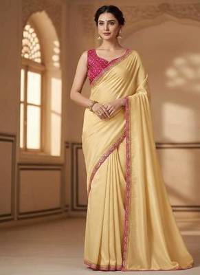 yellow chinon silk saree with sequins lace border 1