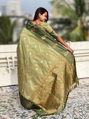 green soft silk saree with zari woven work 2