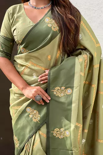 green soft silk saree with zari woven work