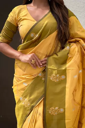 yellow soft silk saree with zari woven work