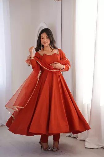 Rust orange solid roman silk chanderi fully stitched flared anarkali suit set