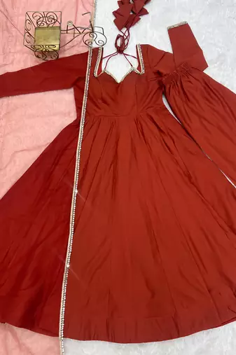 Rust orange solid roman silk chanderi fully stitched flared anarkali suit set