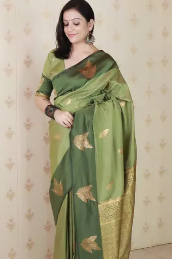 green soft silk saree with zari work