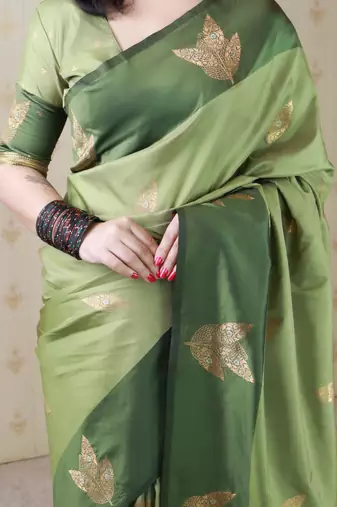 green soft silk saree with zari work