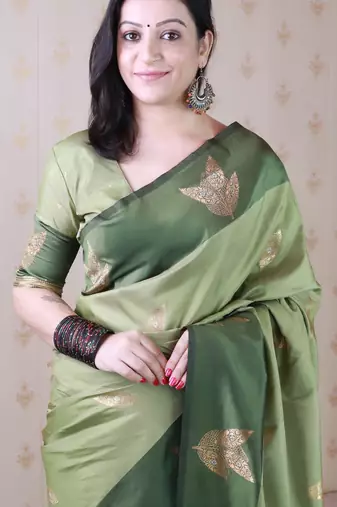green soft silk saree with zari work