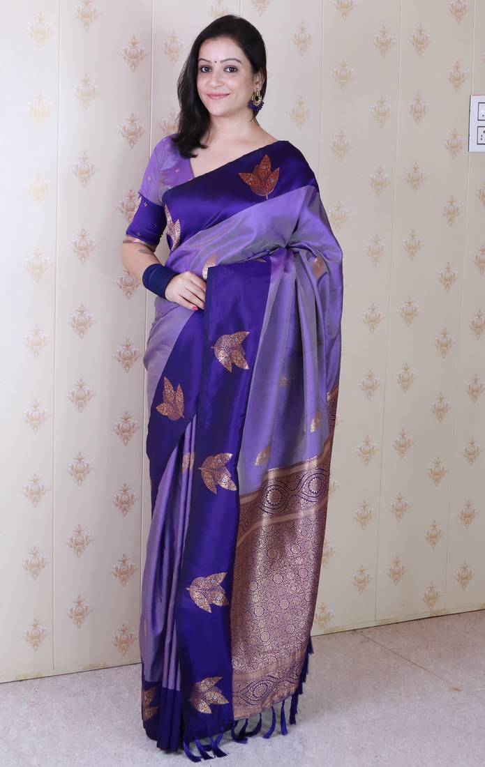 Purple soft silk zari weaving saree with matching blouse piece