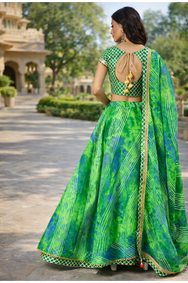 green silk lehenga with printed and lace work 2