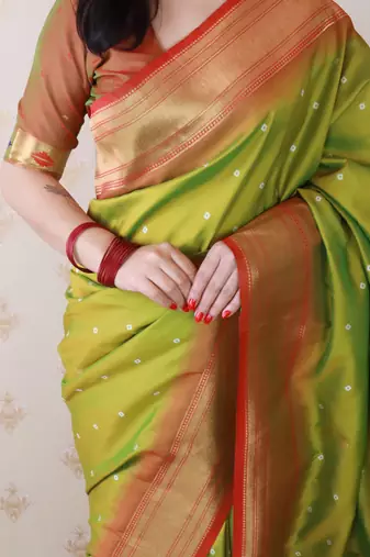 light green paithani silk saree with bandhani zari work